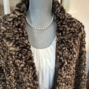 Pamela McCoy leopard fur coat